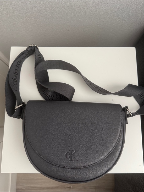 Calvin Klein Handbags - Calvin Klein Charcoal Gray Saddle Crossbody Bag